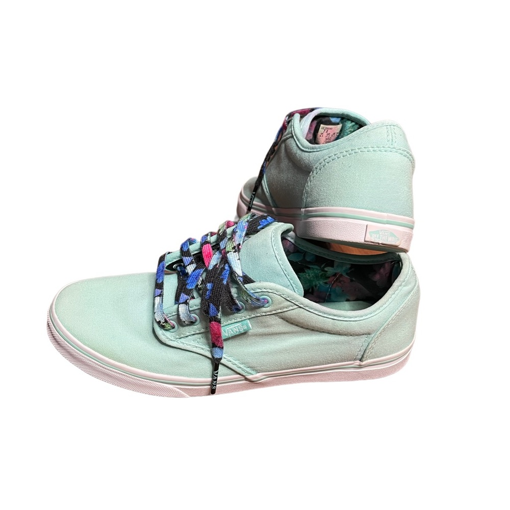 Women’s teal vans with floral
Laces size 7